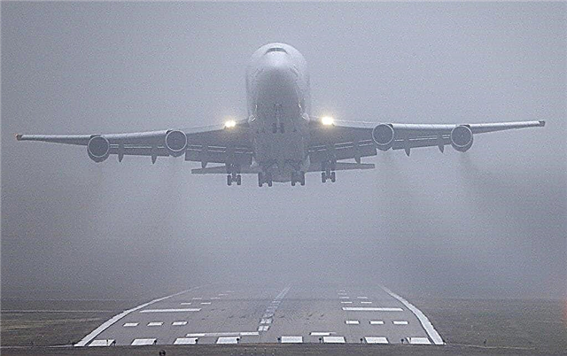 How do planes land in heavy fog and rain?